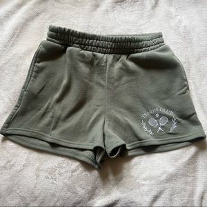 green sweat shorts